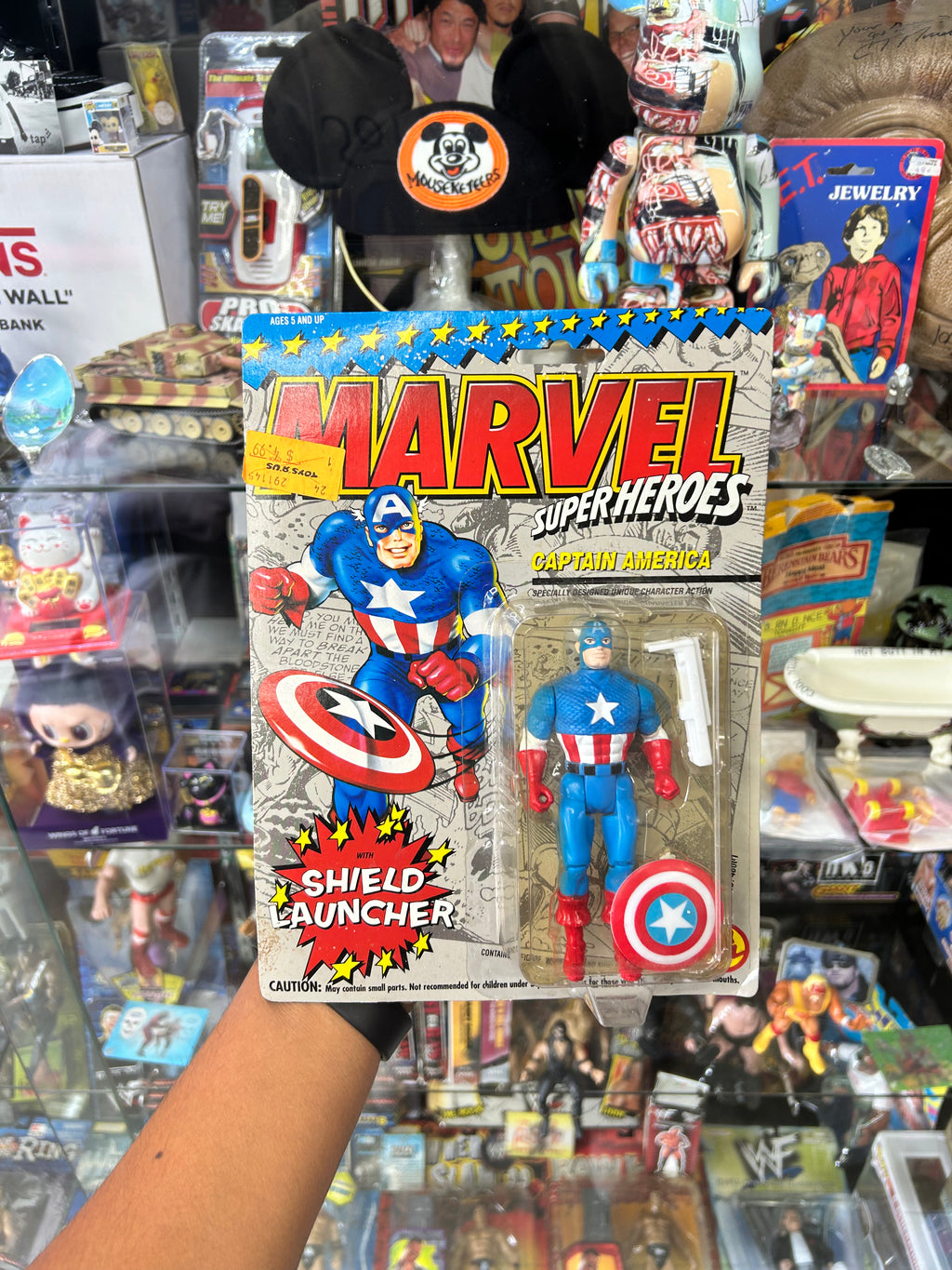 Captain America action figure with a "Shield Launcher" from Toy Biz,  1990