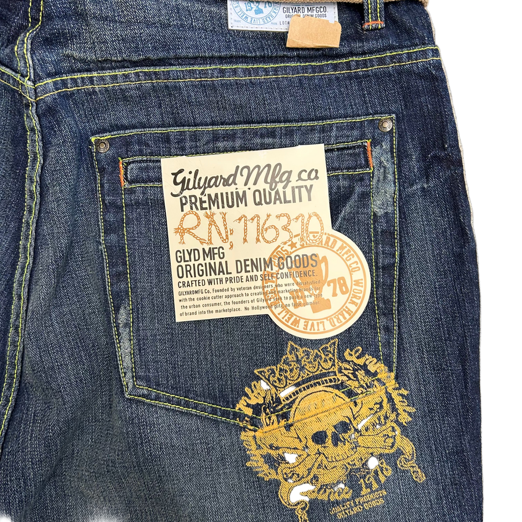 GILYARD MFGCO Distressed denim jeans with ripped details SIZE W 38 L 34